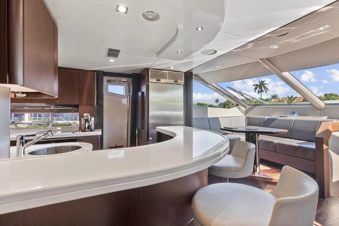 a modern kitchen with a large window aboard F5 Yacht for Sale
