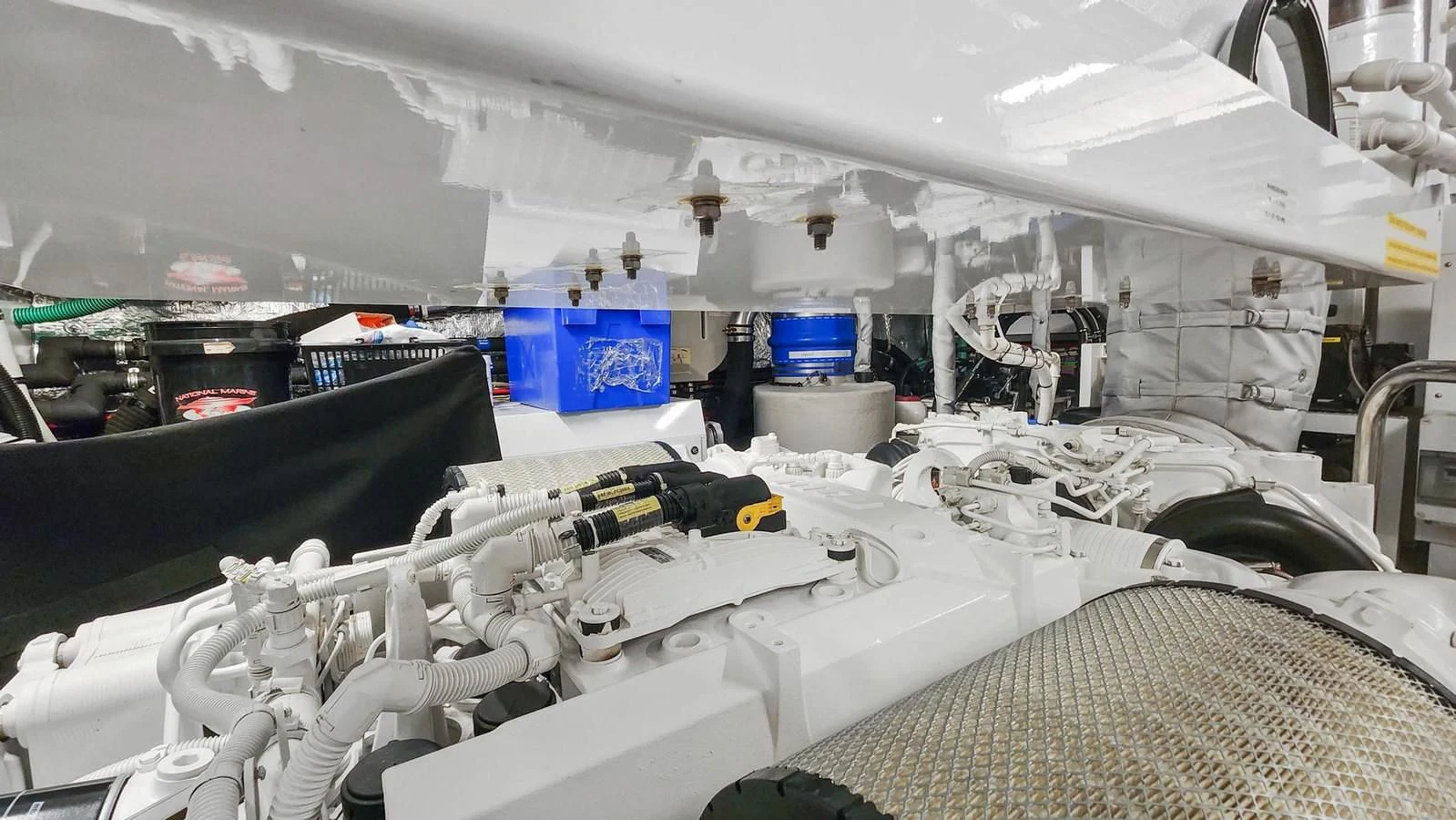 a room with several beds aboard F5 Yacht for Sale