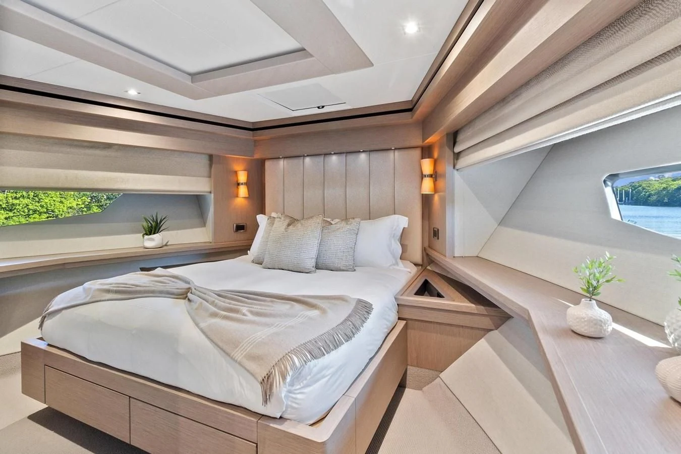 a room with a bed and a window aboard F5 Yacht for Sale