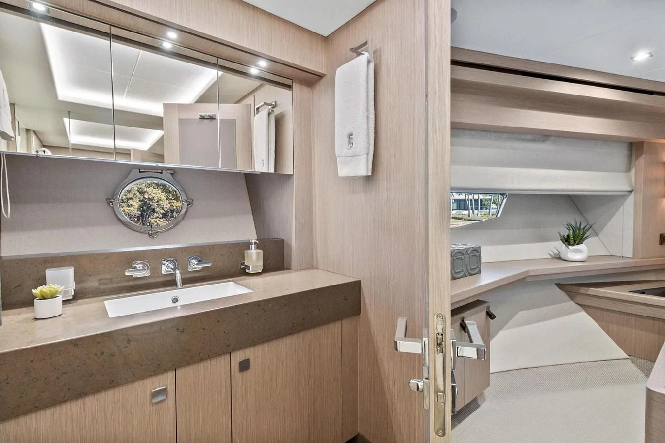 a kitchen with a sink and cabinets aboard F5 Yacht for Sale