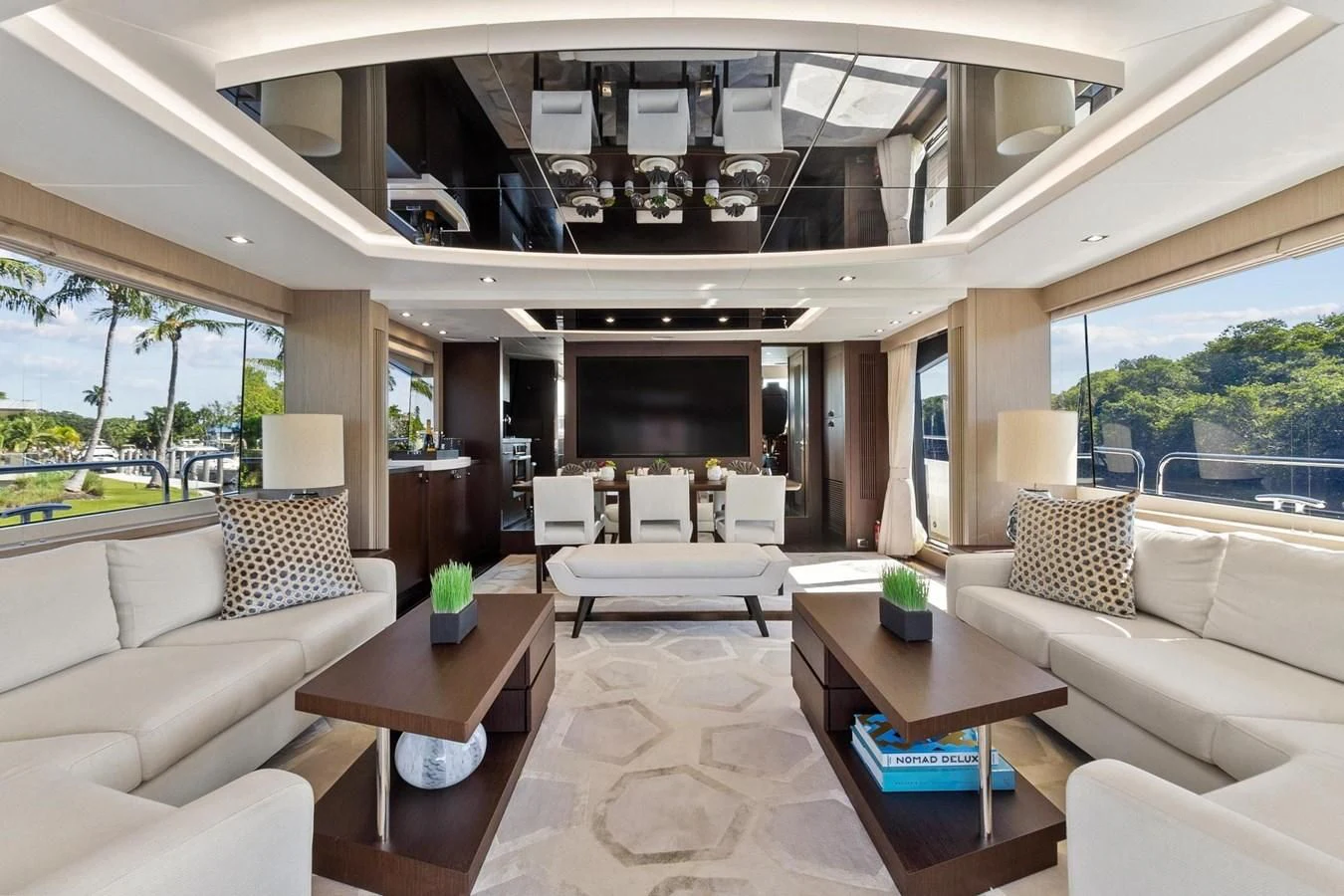 a living room with a large window aboard F5 Yacht for Sale