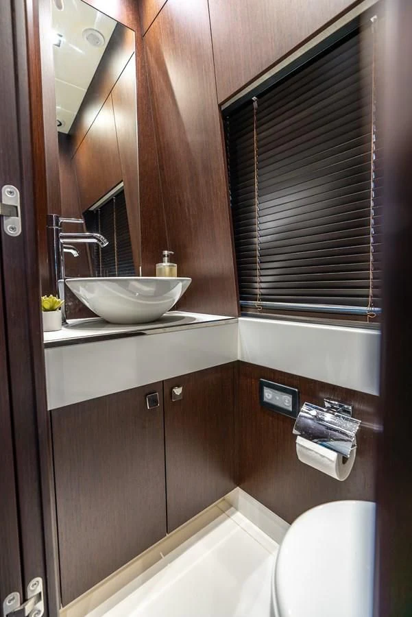 a bathroom with a sink and a toilet aboard F5 Yacht for Sale