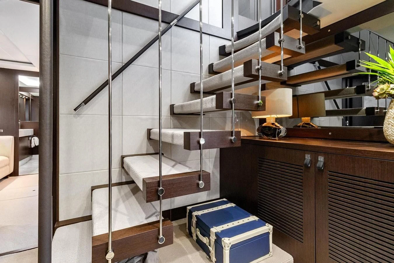 a modern bathroom with a glass wall aboard F5 Yacht for Sale