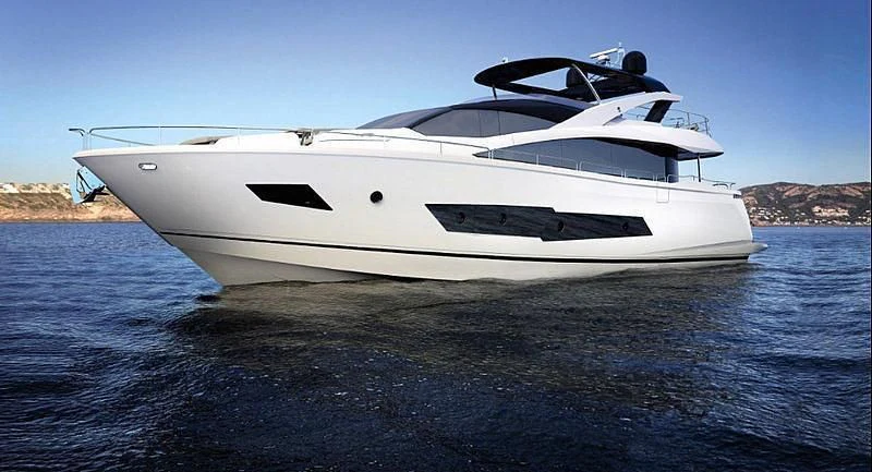 a white yacht on the water aboard F5 Yacht for Sale