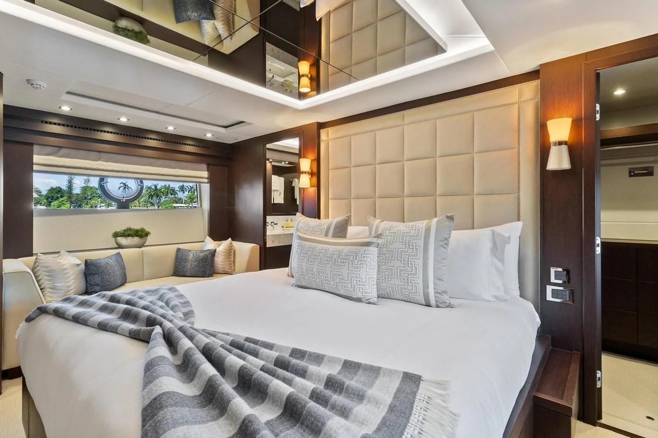 a bed with pillows aboard F5 Yacht for Sale