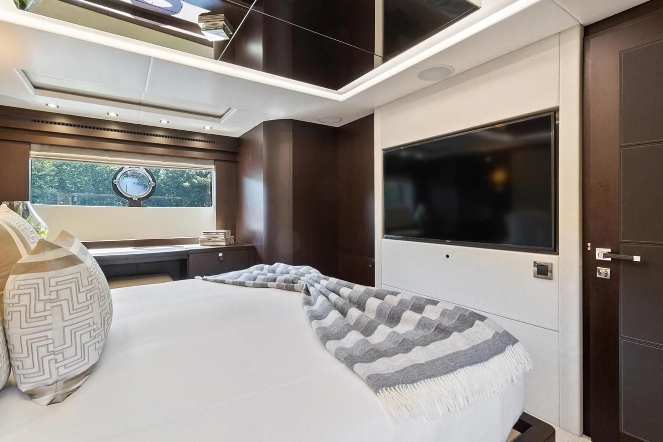 a bed in a room aboard F5 Yacht for Sale