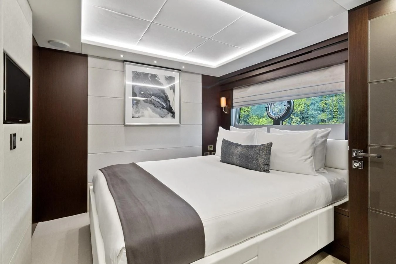 a bed in a room aboard F5 Yacht for Sale
