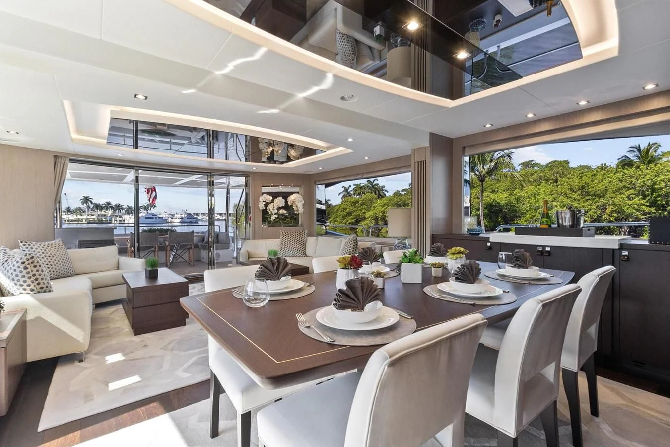 a large kitchen with a table and chairs aboard F5 Yacht for Sale