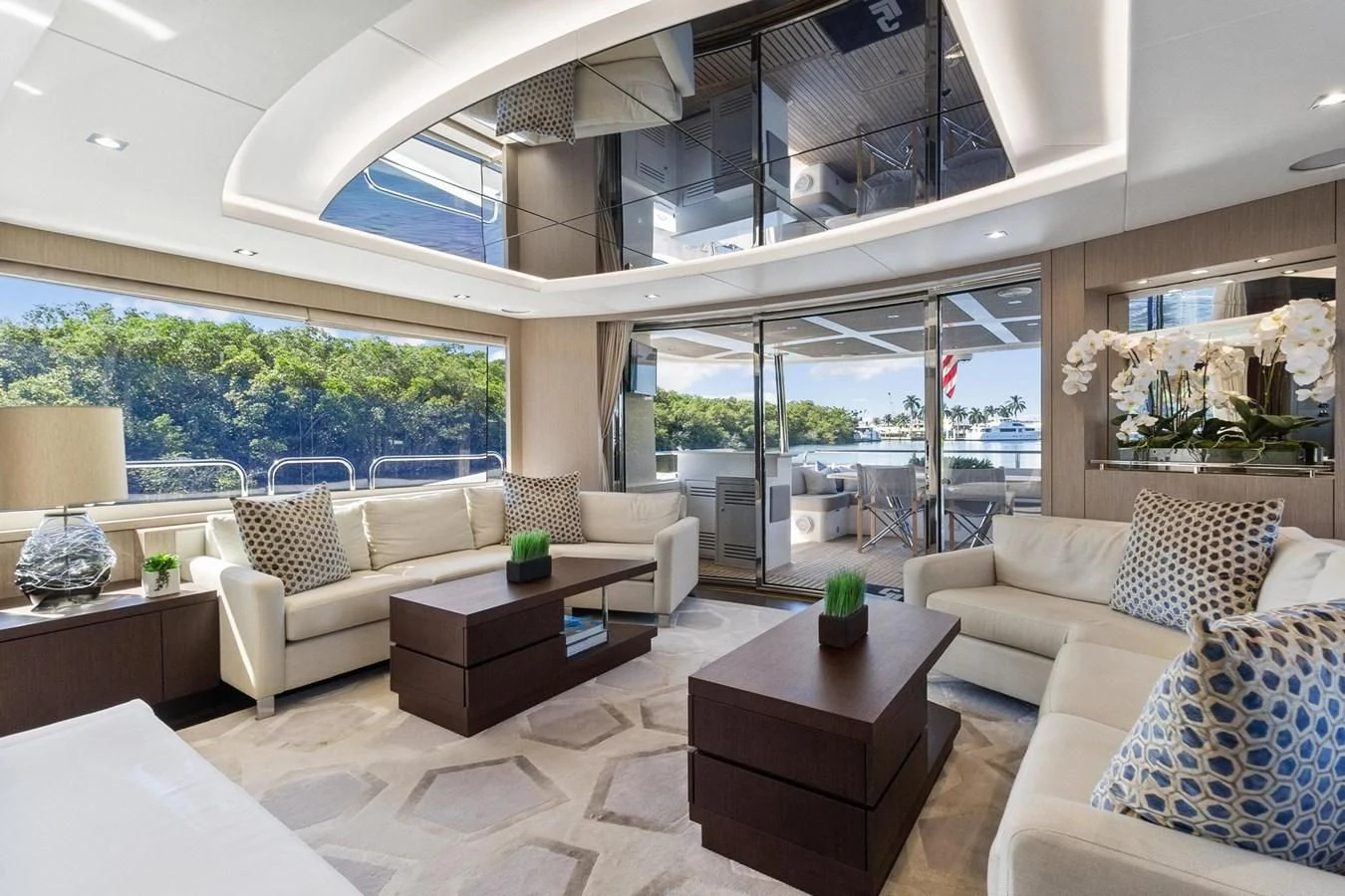 a living room with a large glass window aboard F5 Yacht for Sale