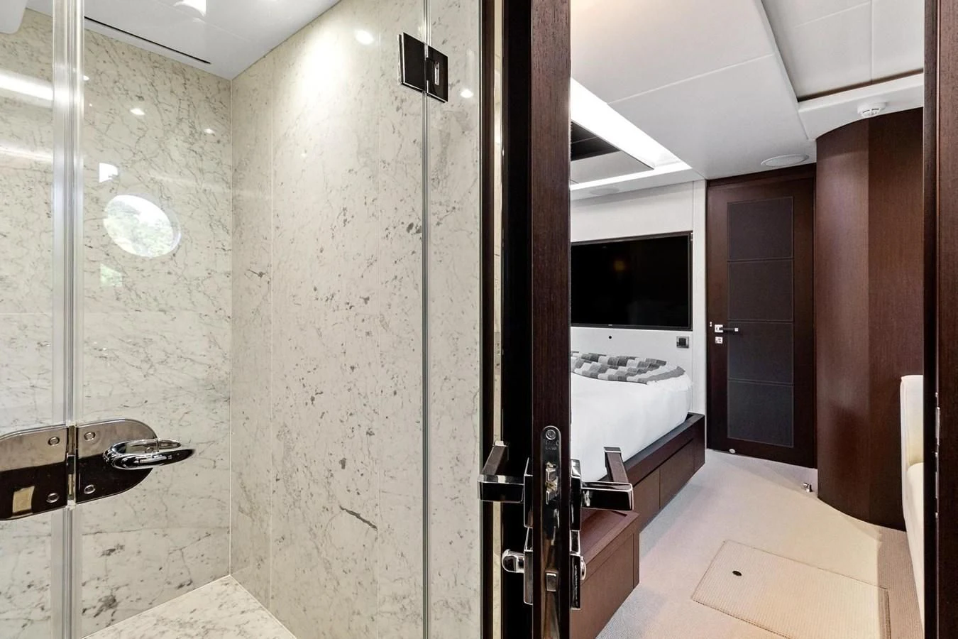 a bathroom with a large shower aboard F5 Yacht for Sale
