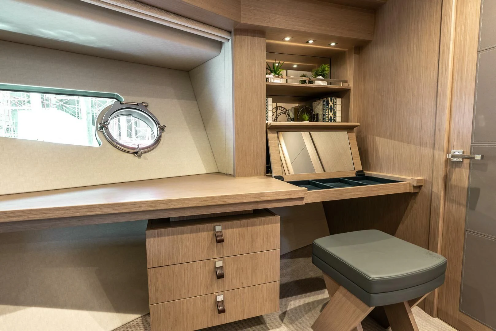a room with a desk and a window aboard F5 Yacht for Sale