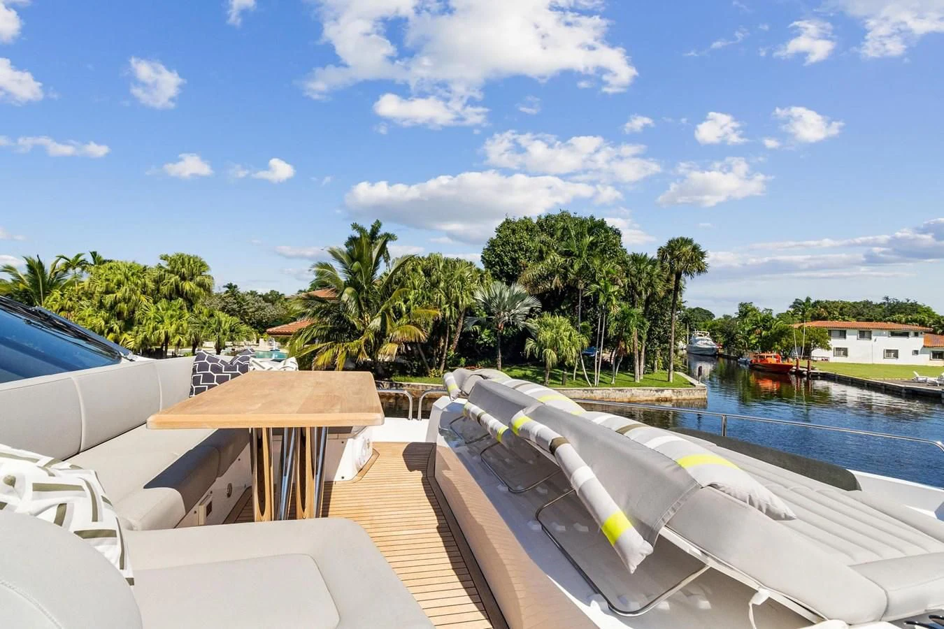 a pool with a deck and trees aboard F5 Yacht for Sale