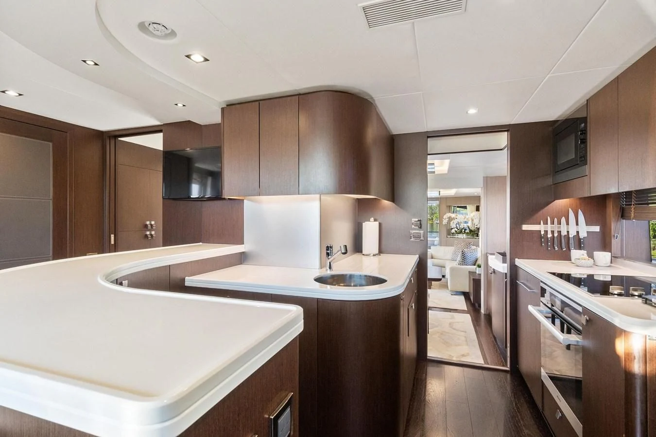 a kitchen with a large island aboard F5 Yacht for Sale