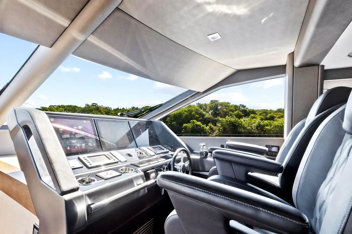 the interior of a car aboard F5 Yacht for Sale