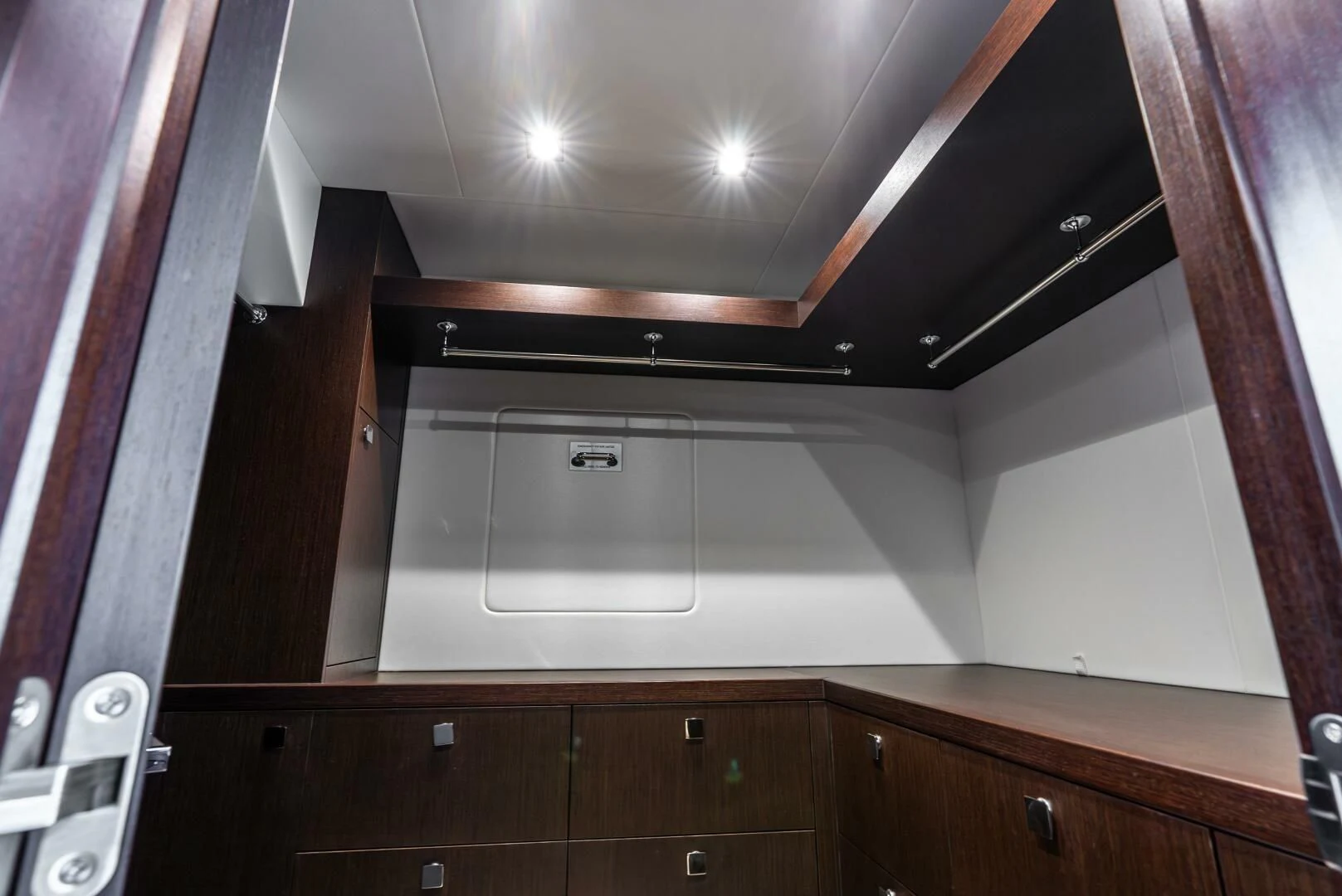 a room with cabinets and a light aboard F5 Yacht for Sale