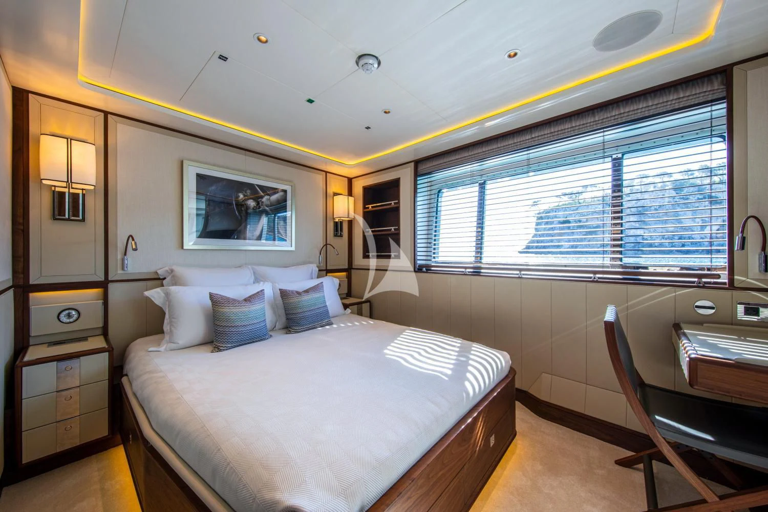 a bedroom with a large bed aboard DELTA ONE Yacht for Charter