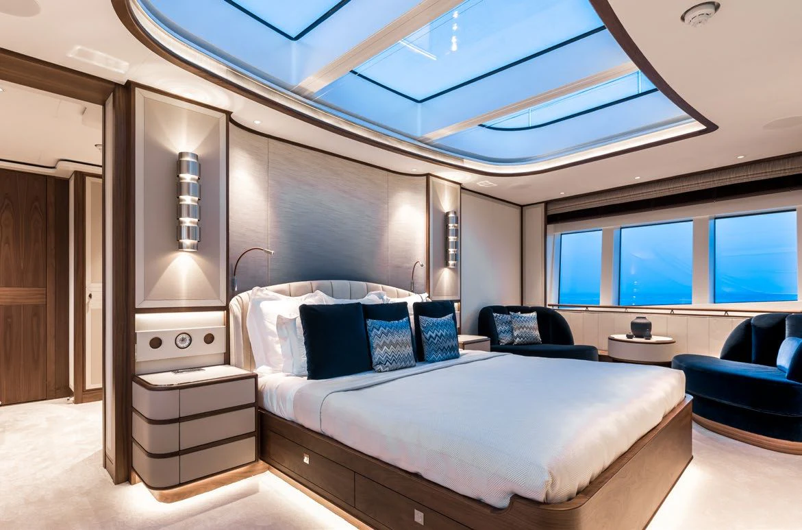 a large bed in a room aboard DELTA ONE Yacht for Charter