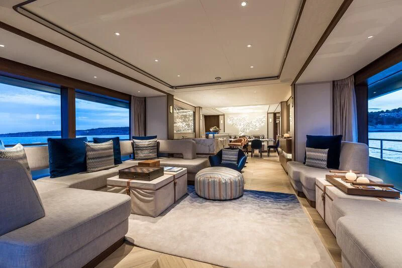 a living room with a large window aboard DELTA ONE Yacht for Charter