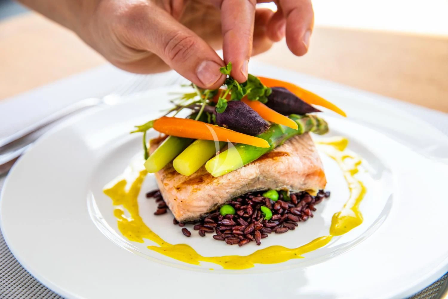 a plate of food aboard DELTA ONE Yacht for Charter