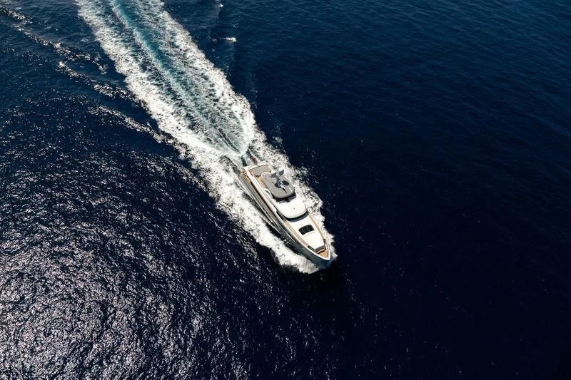 a white boat on the water aboard DELTA ONE Yacht for Charter