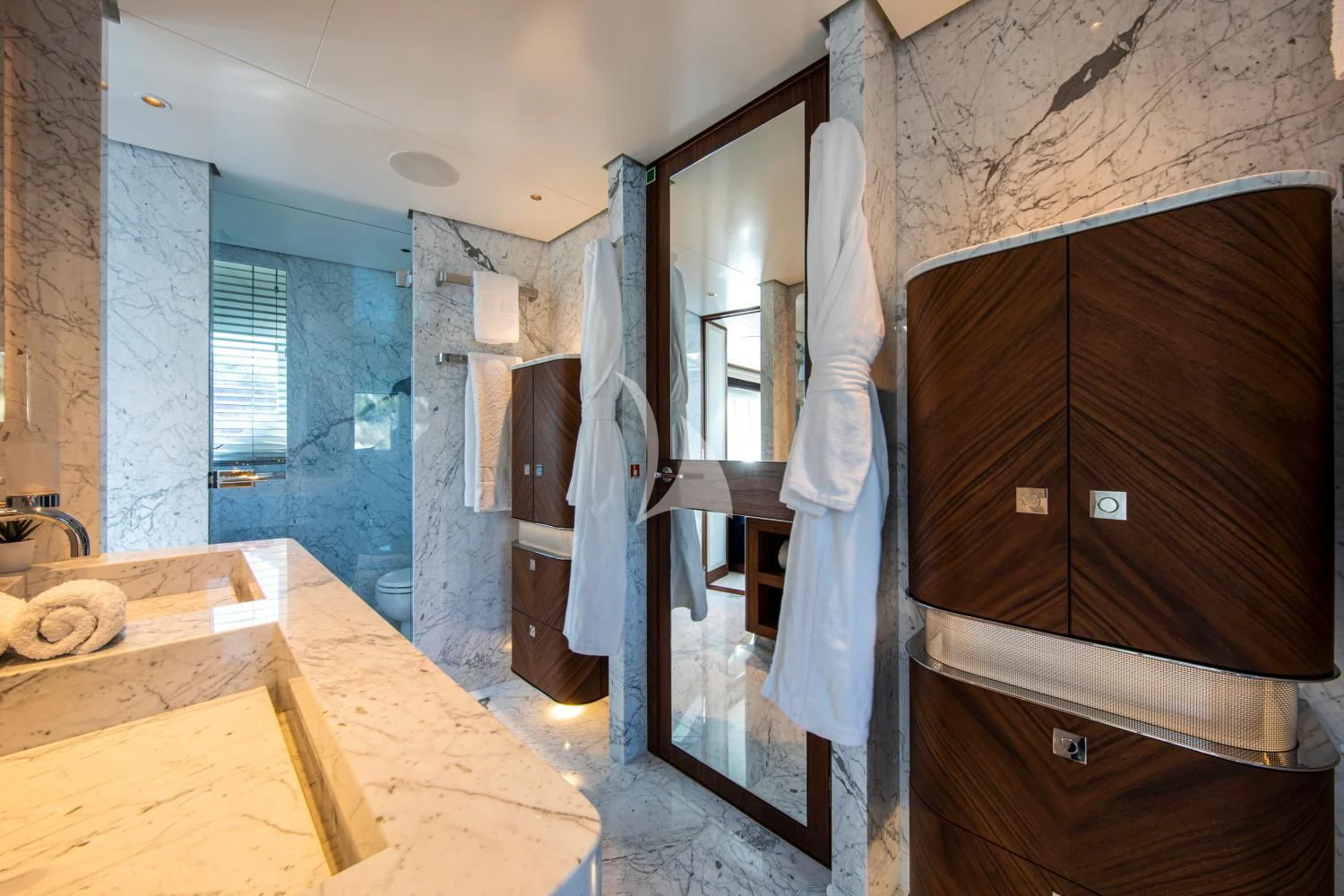 a bathroom with a countertop sink and a mirror aboard DELTA ONE Yacht for Charter