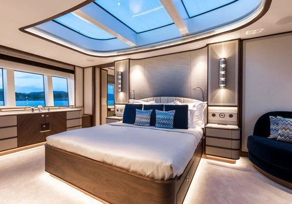 a large bed in a room aboard DELTA ONE Yacht for Charter
