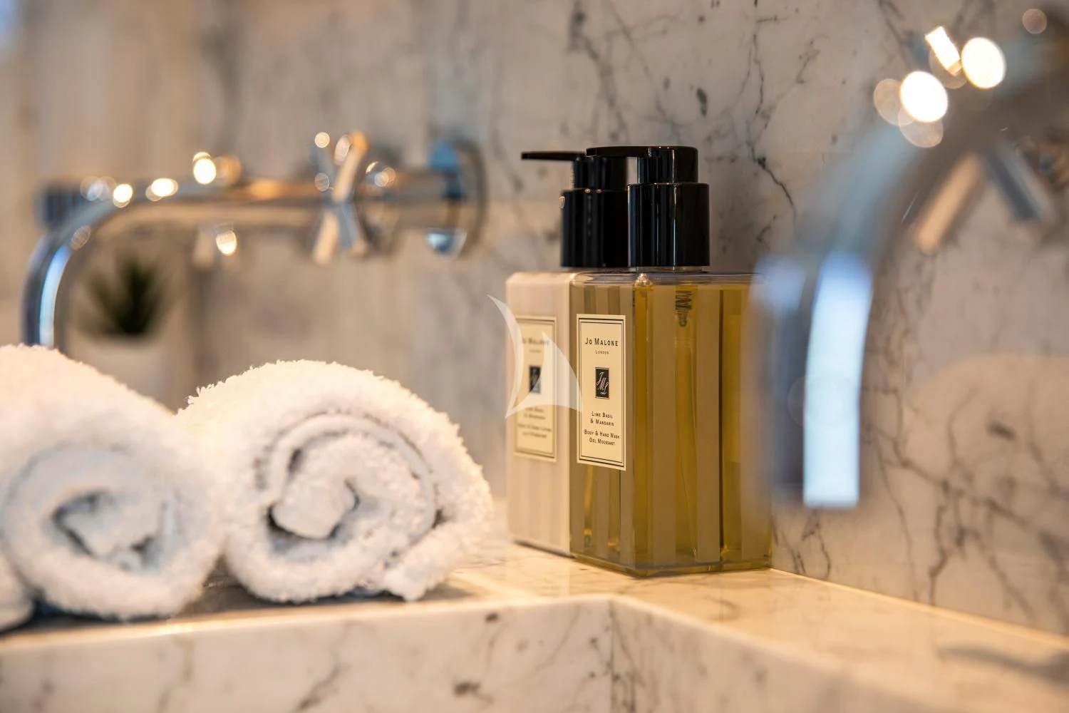 a large white towel next to a machine aboard DELTA ONE Yacht for Charter