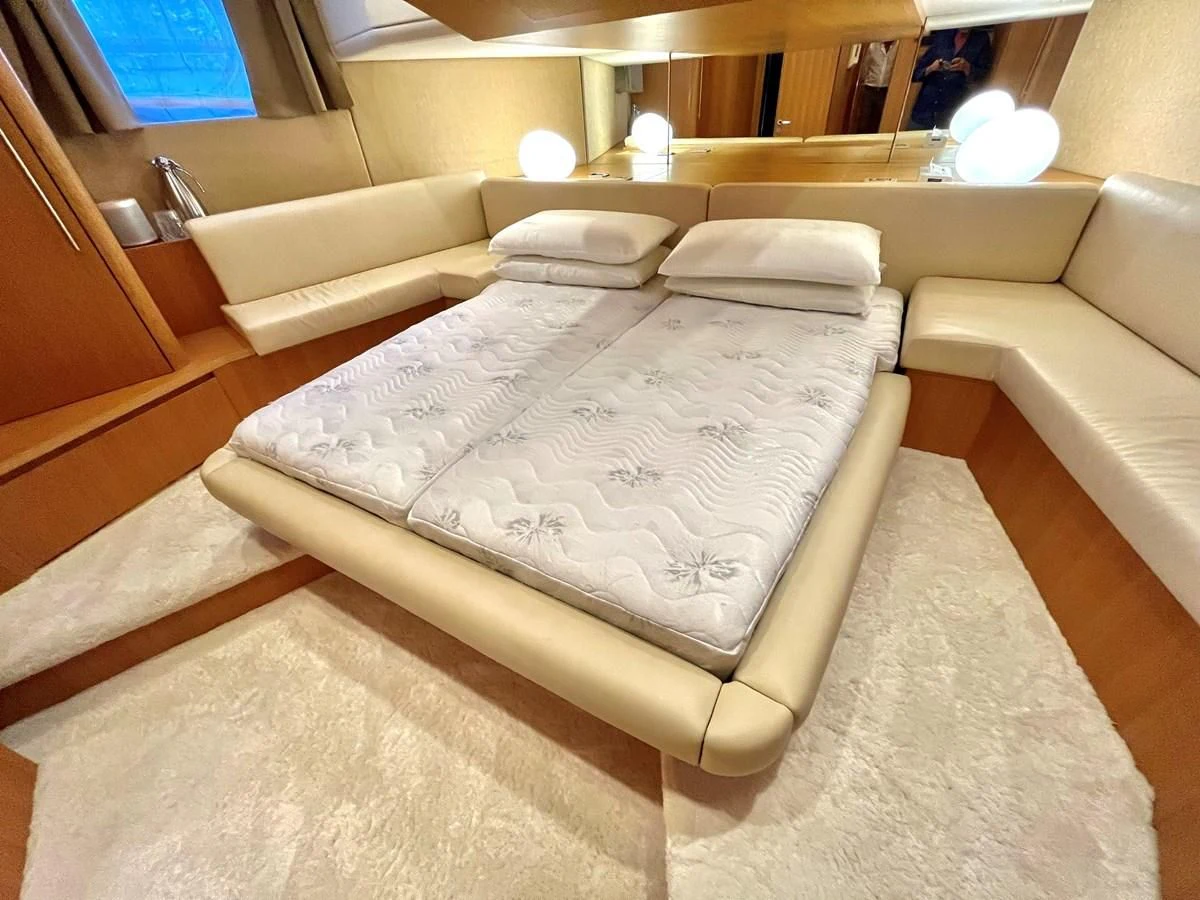 a bed in a room aboard AICON 85 Yacht for Sale