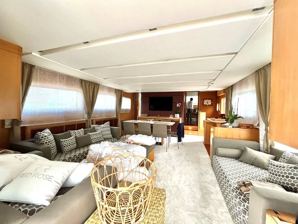 a living room with a large bed aboard AICON 85 Yacht for Sale