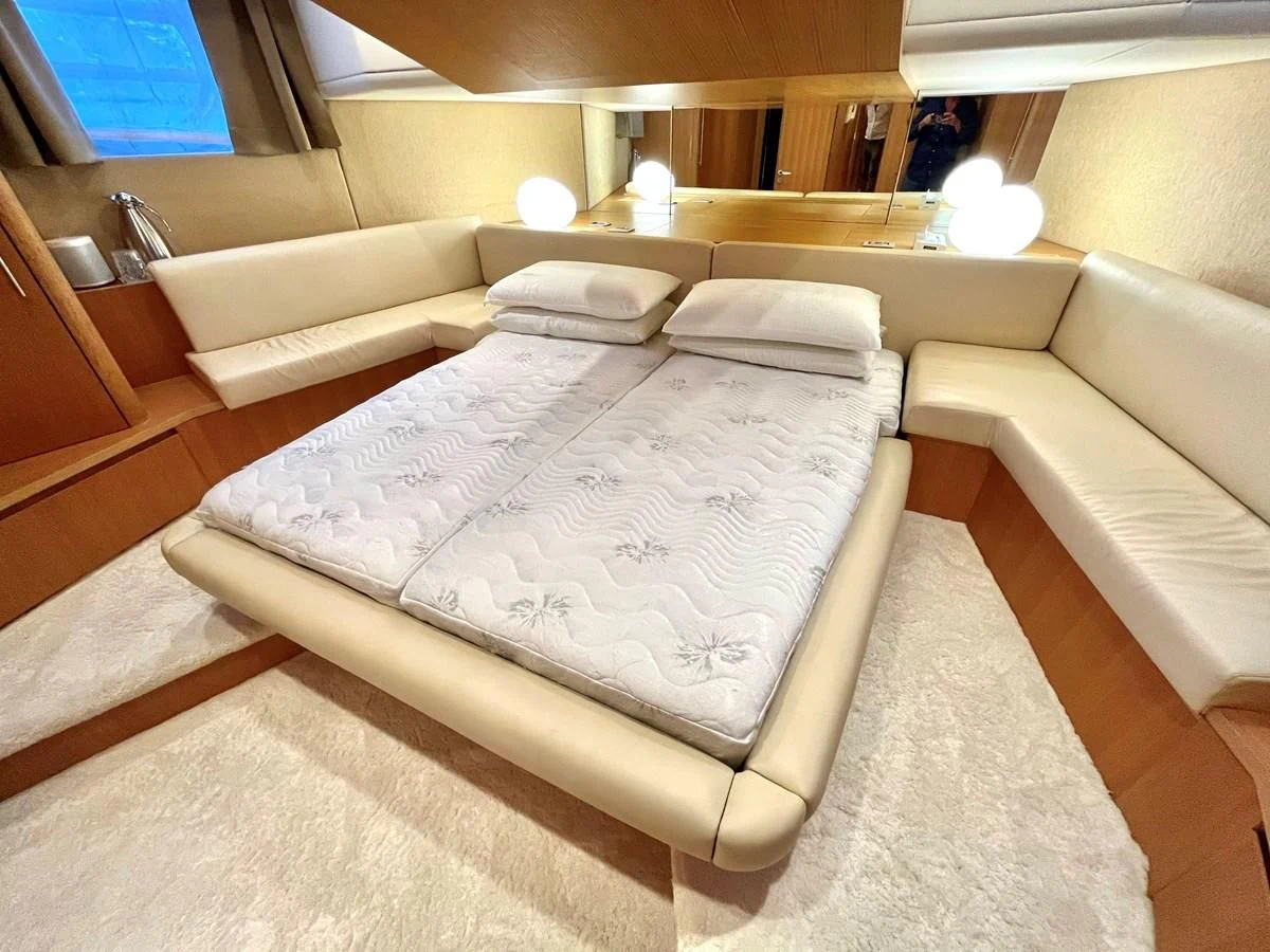 a bed in a room aboard AICON 85 Yacht for Sale