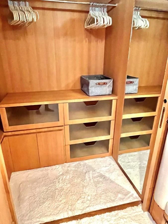 a wooden shelf with a box on it aboard AICON 85 Yacht for Sale