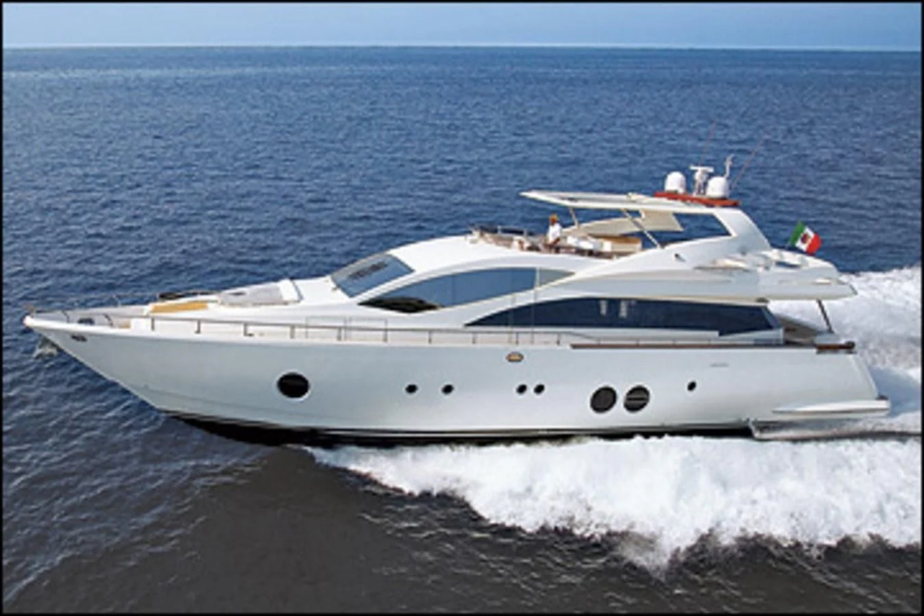 a white yacht on the beach aboard AICON 85 Yacht for Sale