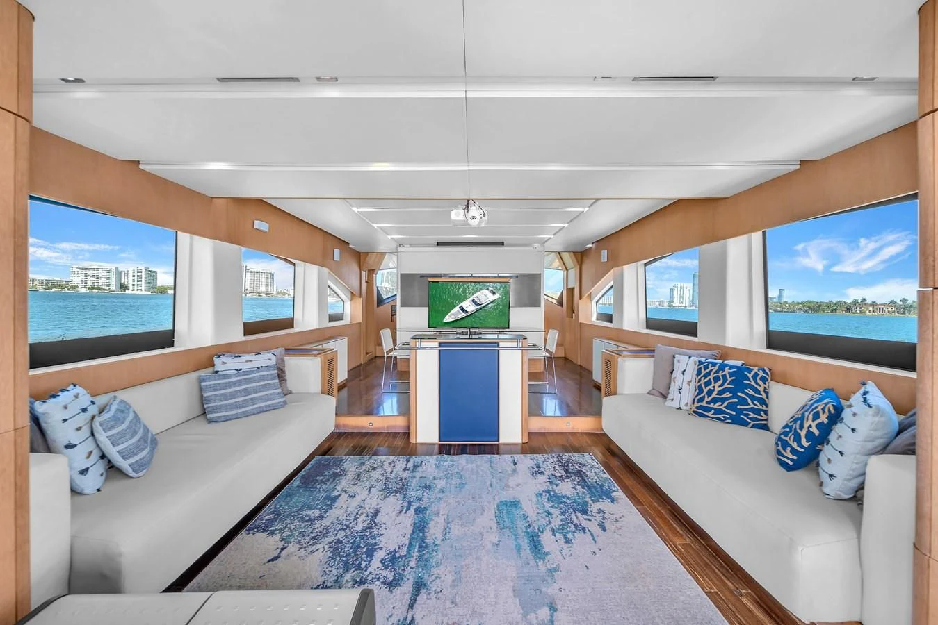 a room with a couch and a television aboard AICON 85 Yacht for Sale