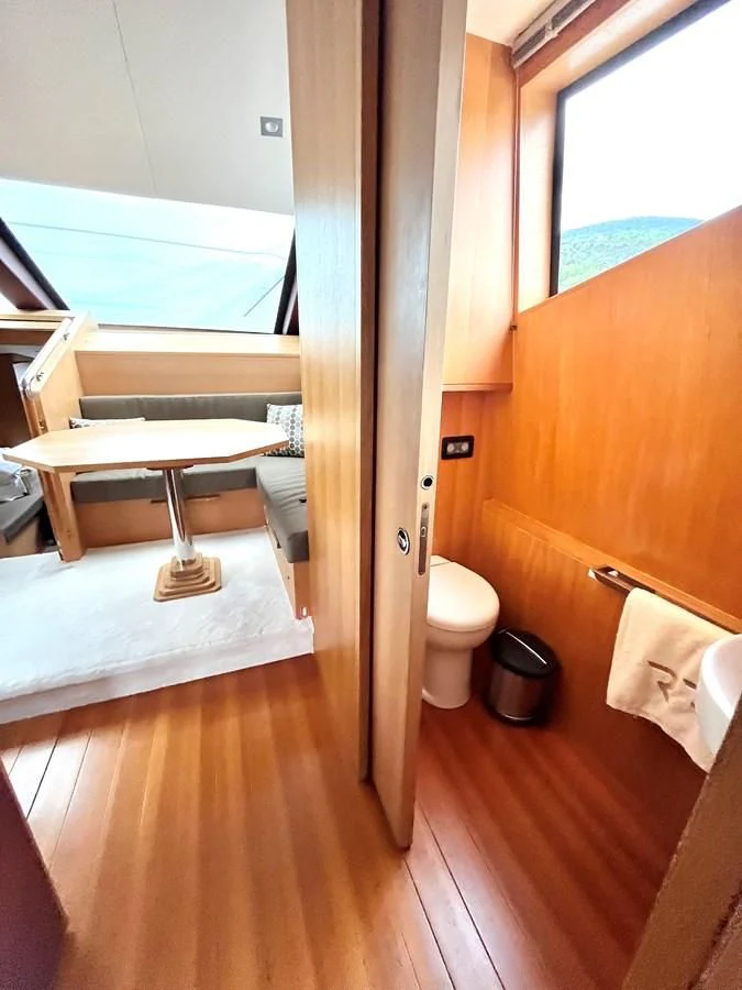 a bathroom with a tub and toilet aboard AICON 85 Yacht for Sale