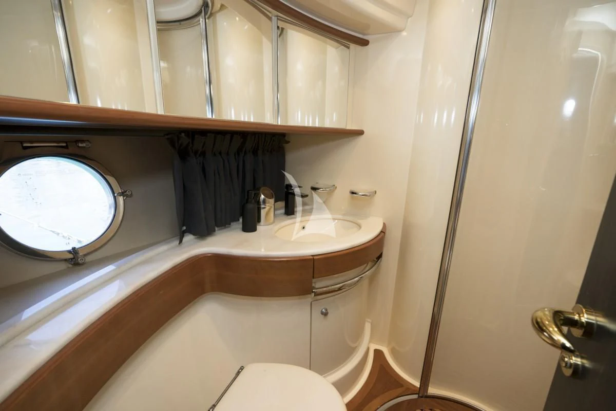 a bathroom with a tub sink and toilet aboard MEDUSA Yacht for Charter
