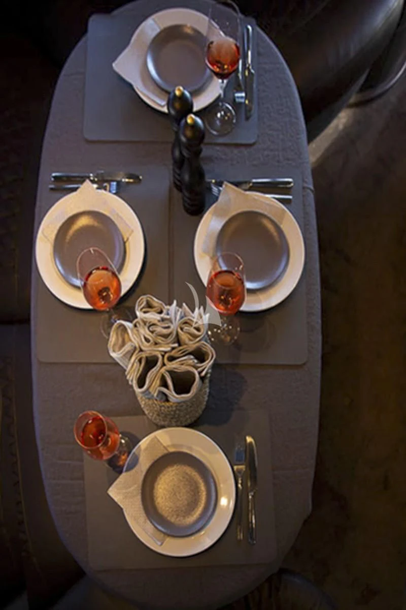 a set of plates and glasses aboard MEDUSA Yacht for Charter