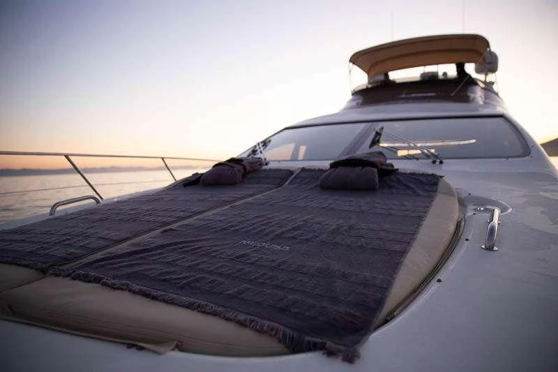 a suitcase on a bed aboard MEDUSA Yacht for Charter
