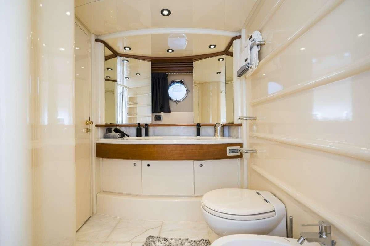 a bathroom with a large mirror aboard MEDUSA Yacht for Charter