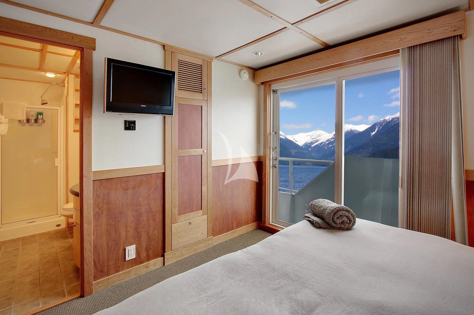 a bed in a room aboard SAFARI QUEST Yacht for Sale