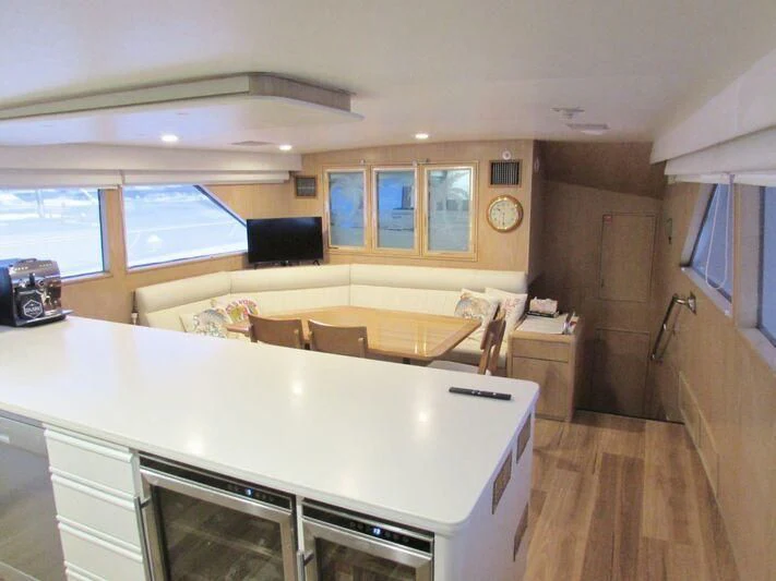 a kitchen with a large island aboard GOOD NEWS Yacht for Sale