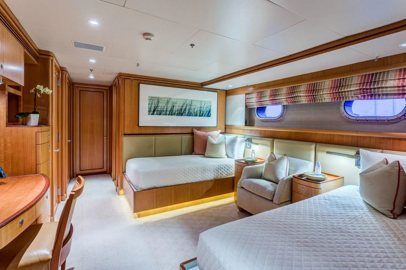 a room with a bed and a couch aboard HELIOS 2 Yacht for Sale