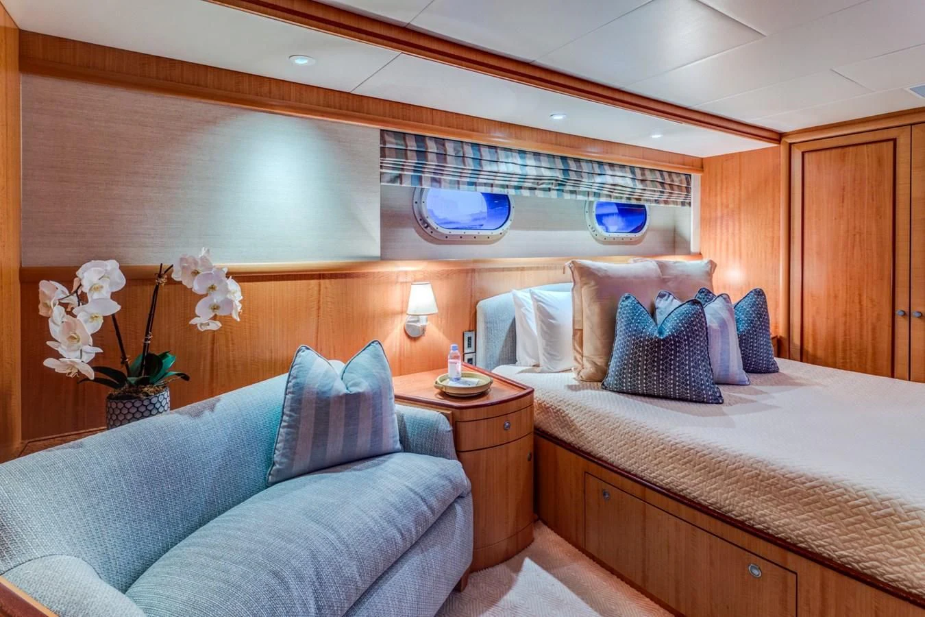 a room with a bed and a couch aboard HELIOS 2 Yacht for Sale
