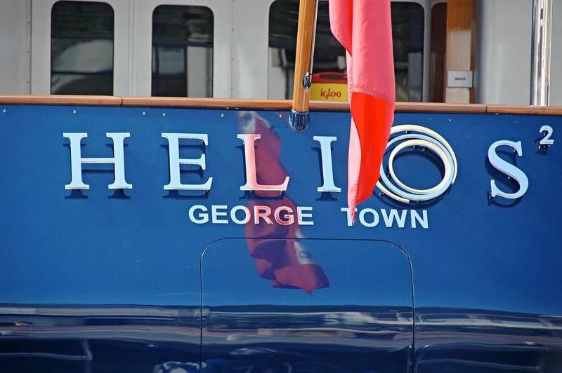 a blue bus with white lettering aboard HELIOS 2 Yacht for Sale