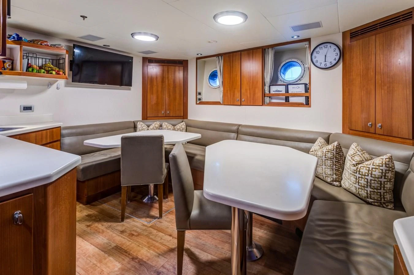 a kitchen and dining area aboard HELIOS 2 Yacht for Sale