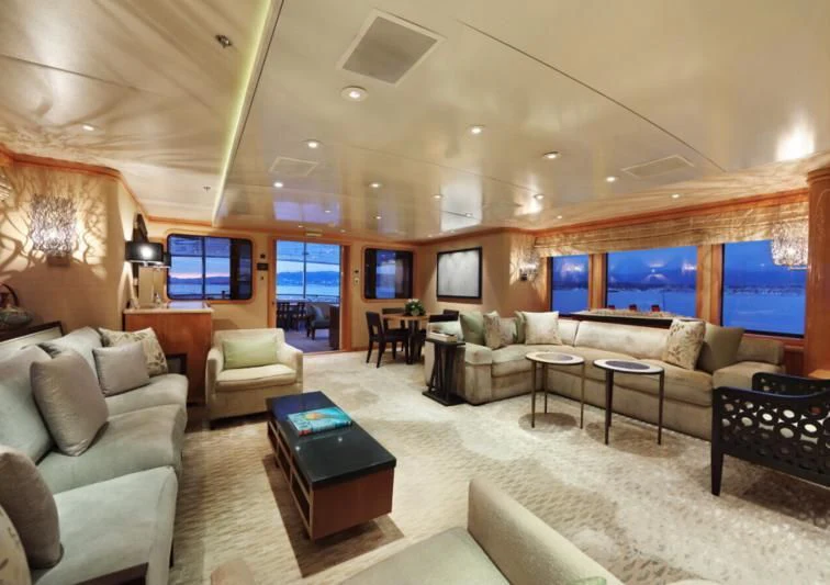 a living room with a large window aboard HELIOS 2 Yacht for Sale