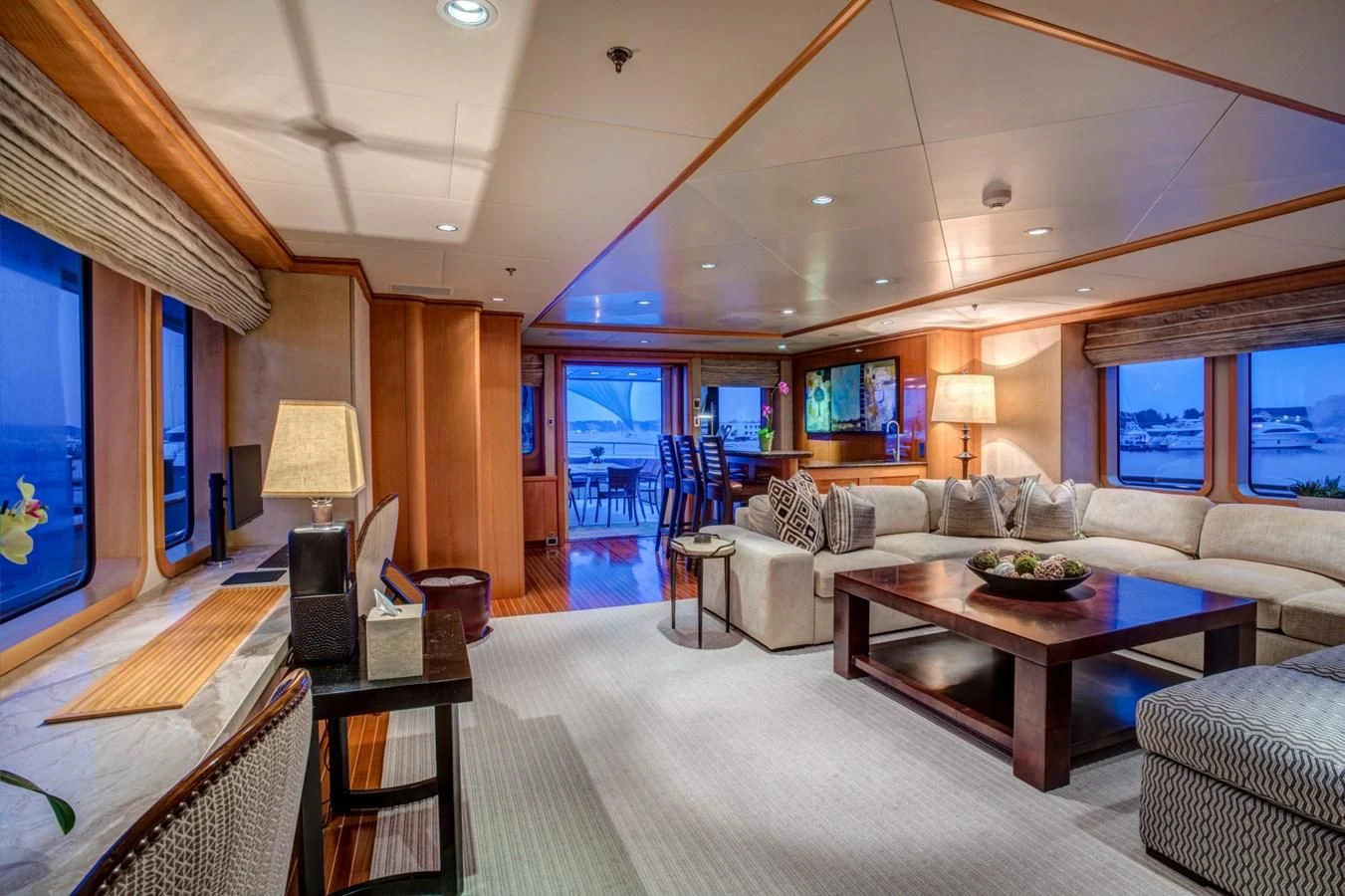 a living room with a large window aboard HELIOS 2 Yacht for Sale