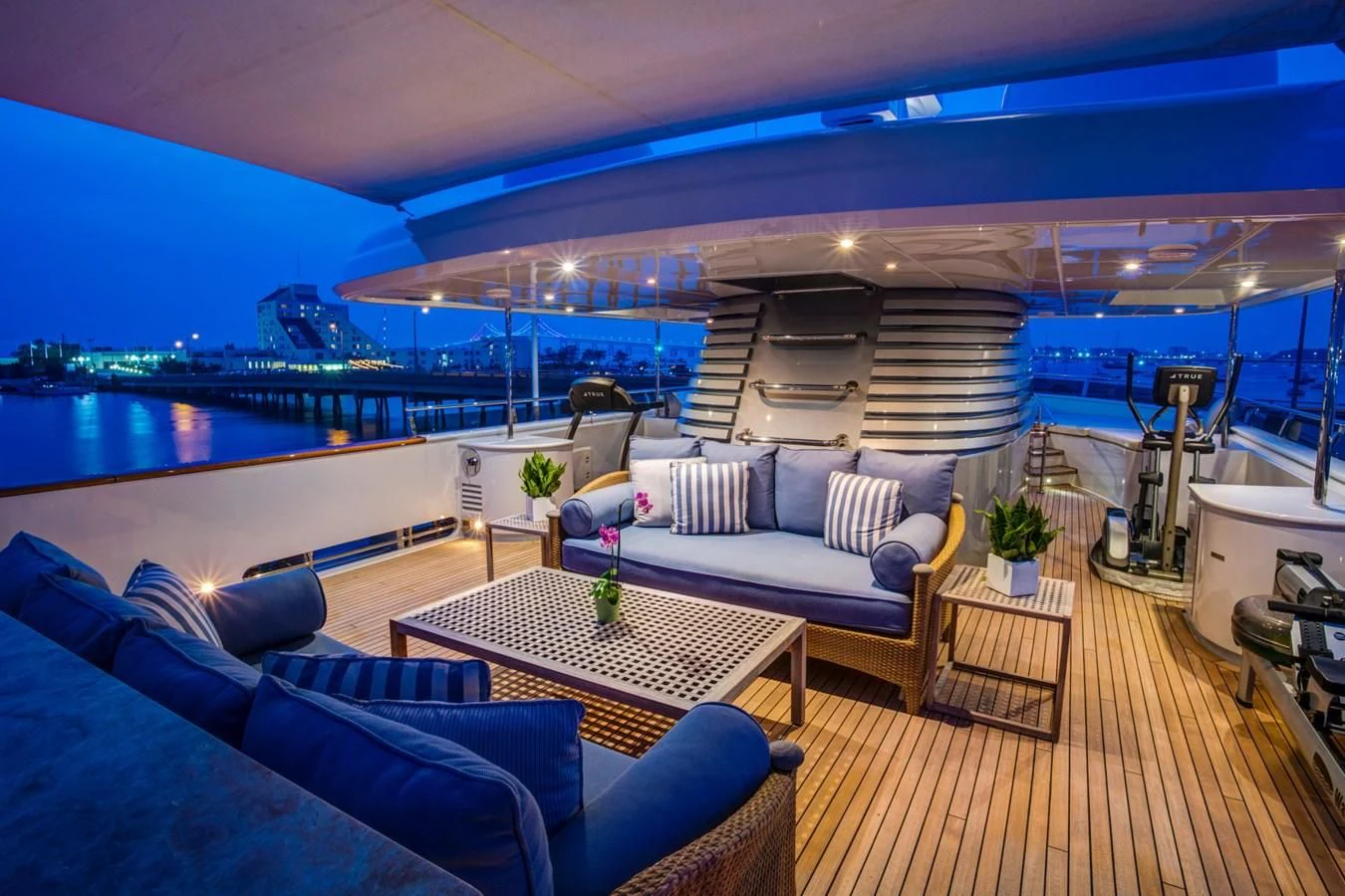 a living room with a large pool aboard HELIOS 2 Yacht for Sale