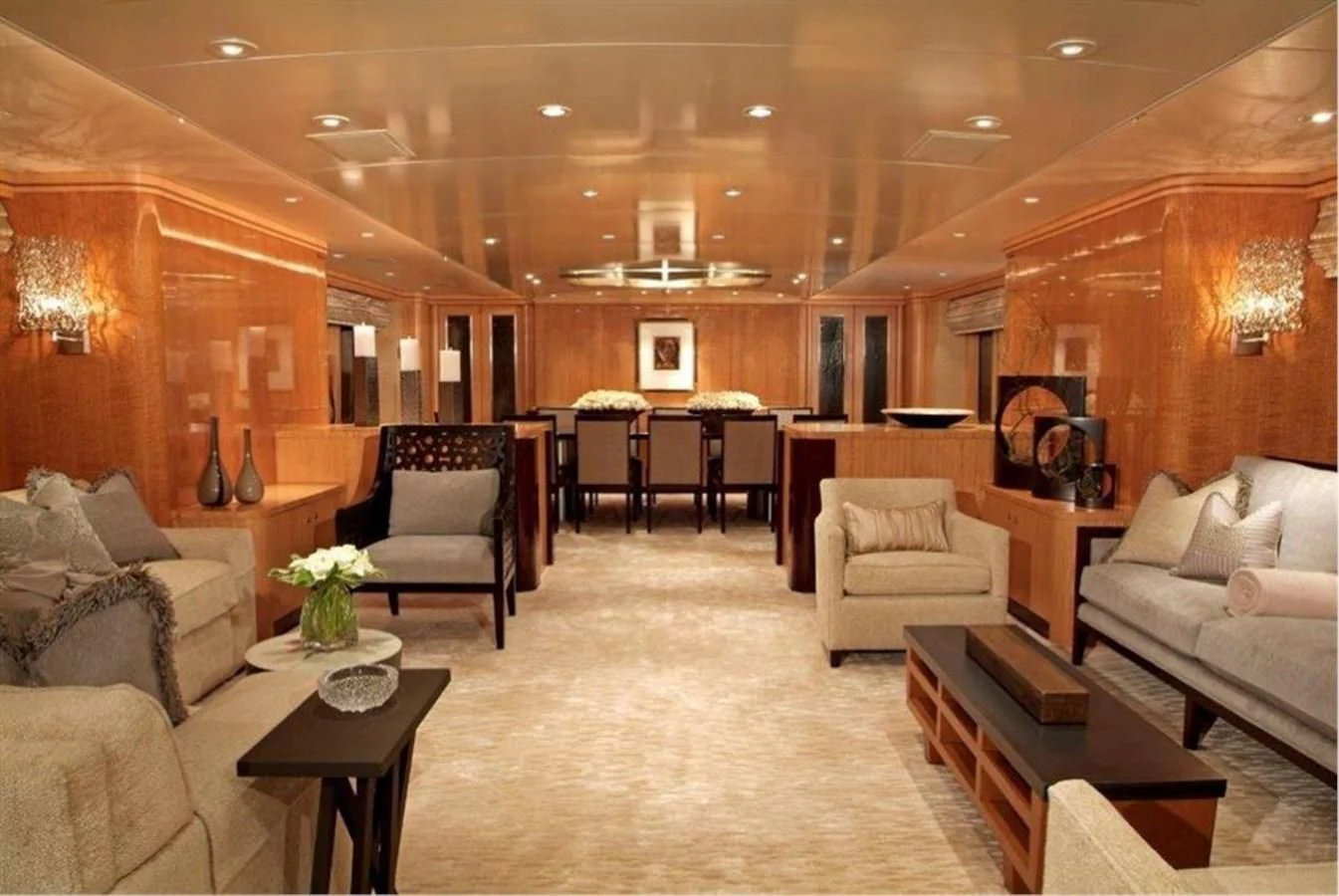 a living room with a large mirror aboard HELIOS 2 Yacht for Sale