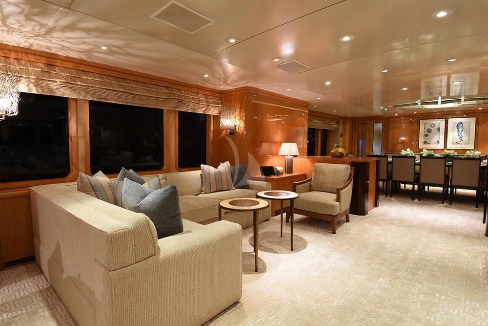a living room with a couch and a tv aboard HELIOS 2 Yacht for Sale