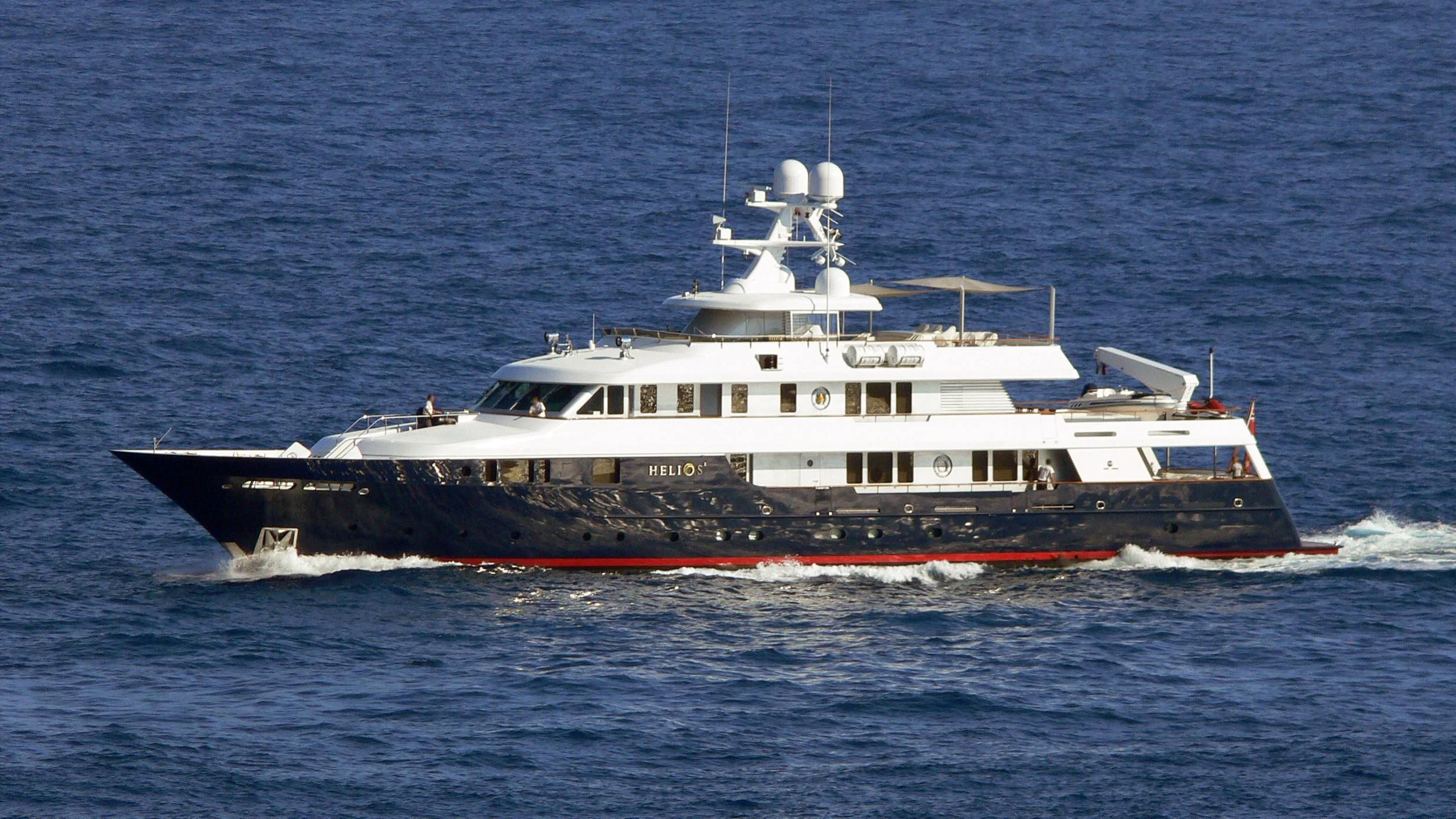 a large boat on the water aboard HELIOS 2 Yacht for Sale